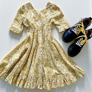 Size 6 Girls orange & yellow floral twirly dress